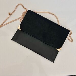 Elegant Black Clutch with Gold Chain